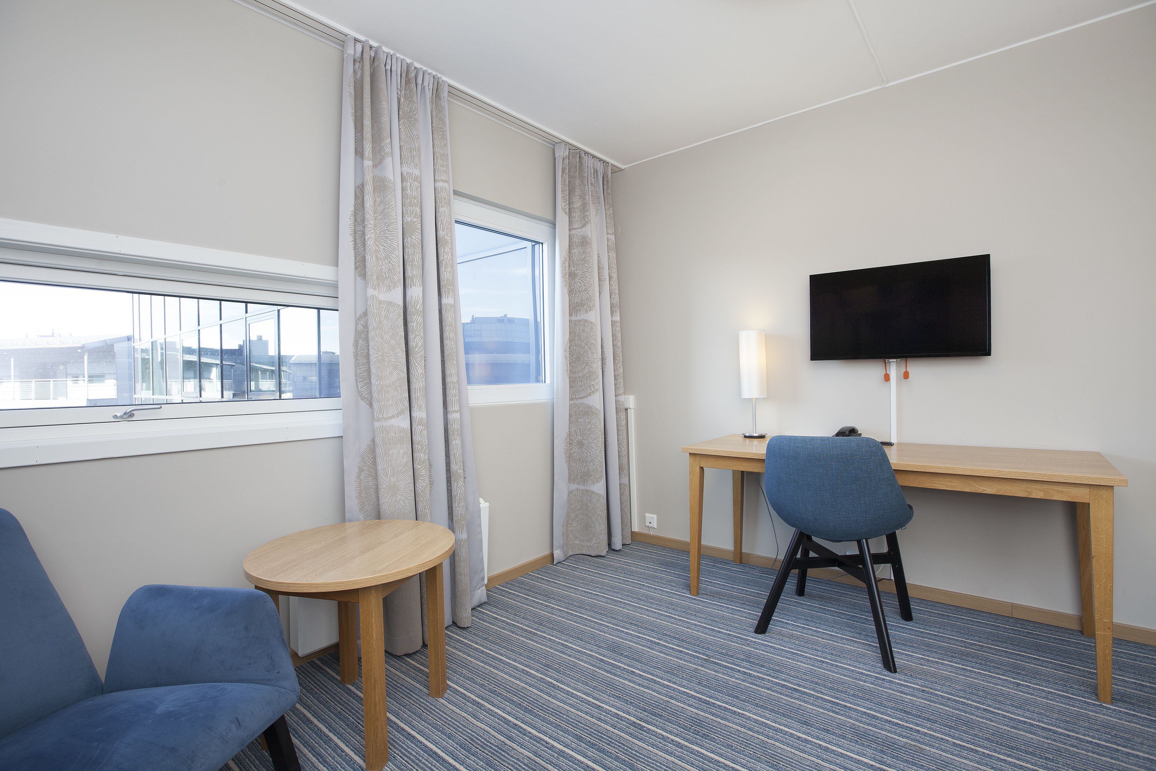 premium bedding, memory-foam beds, laptop workspace, free wifi