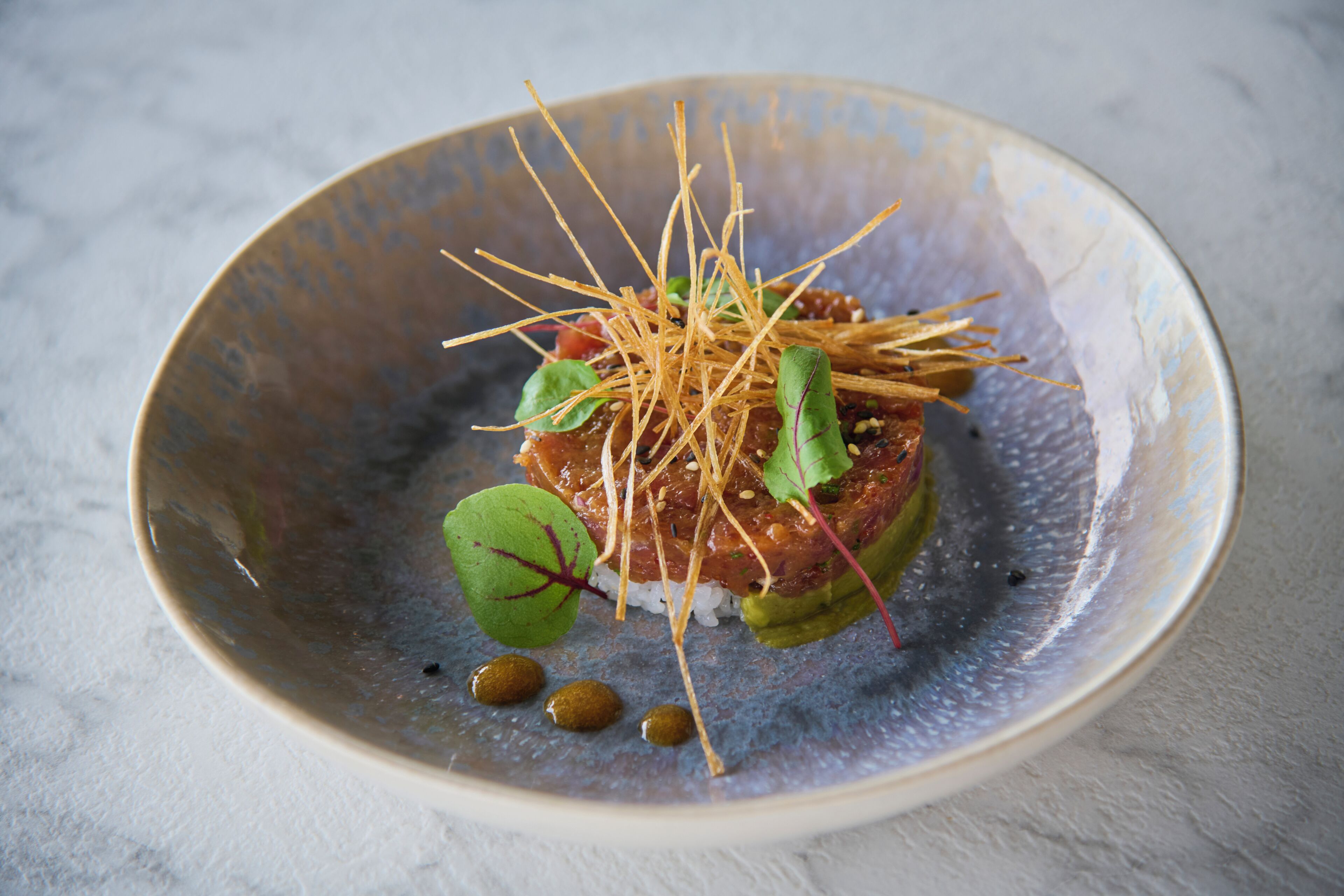 A bowl with a food presentation.