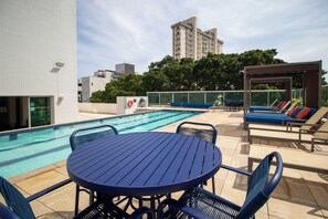 Outdoor pool, open 6:00 AM to 10:00 PM, pool umbrellas, sun loungers