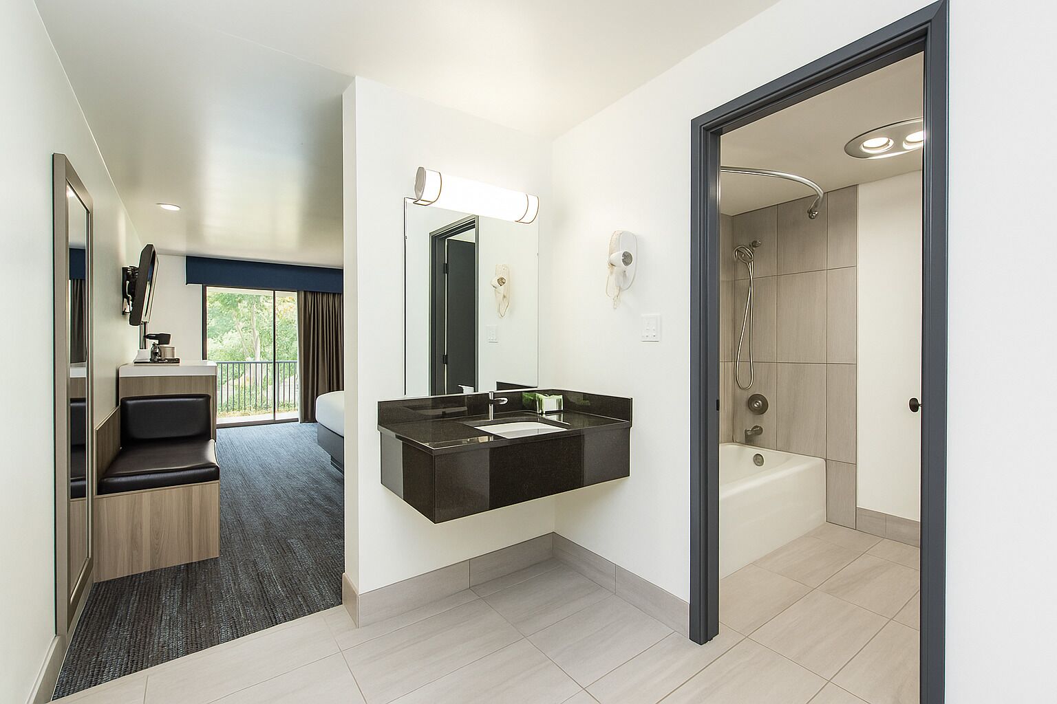 Foto - Oyster Bay Inn & Suites