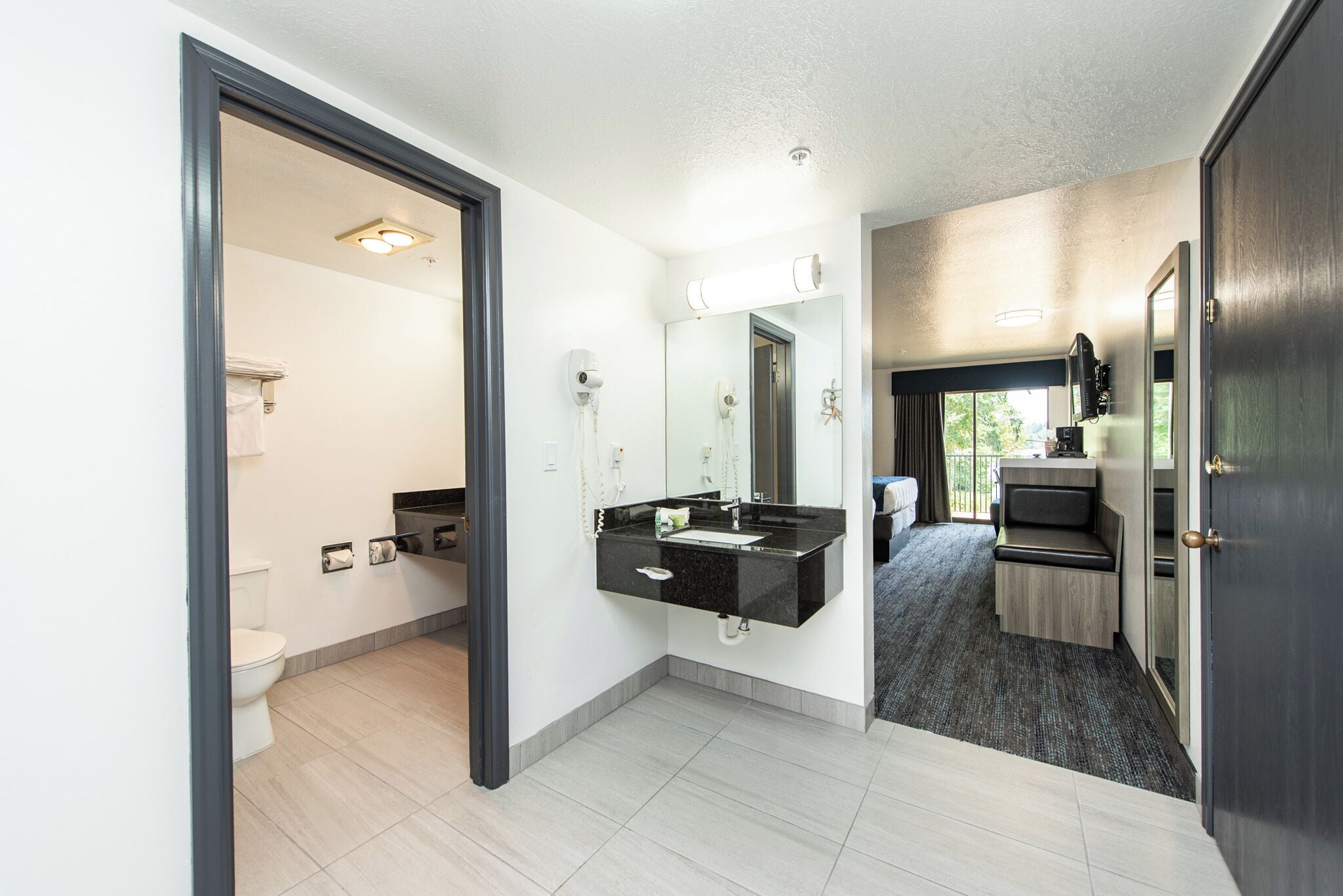 Foto - Oyster Bay Inn & Suites