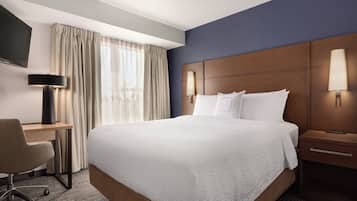 Desk, laptop workspace, blackout drapes, iron/ironing board