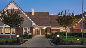 A hotel entrance with a brick facade, a clear sky, and a sign reading "Residence Inn Marriott". - Residence Inn by Marriott Sacramento Folsom (Folsom)