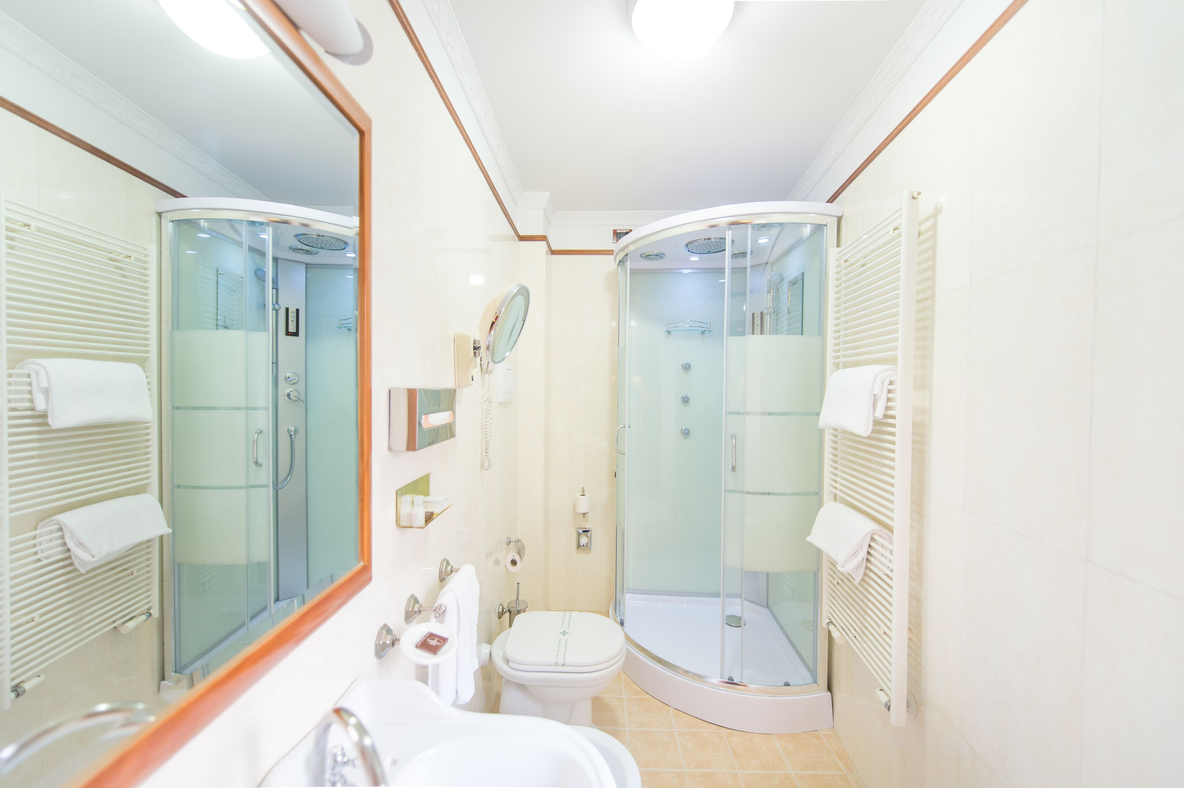 deluxe triple room | bathroom | hair dryer, slippers, bidet, towels