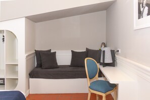Habitación triple superior | Zona de estar