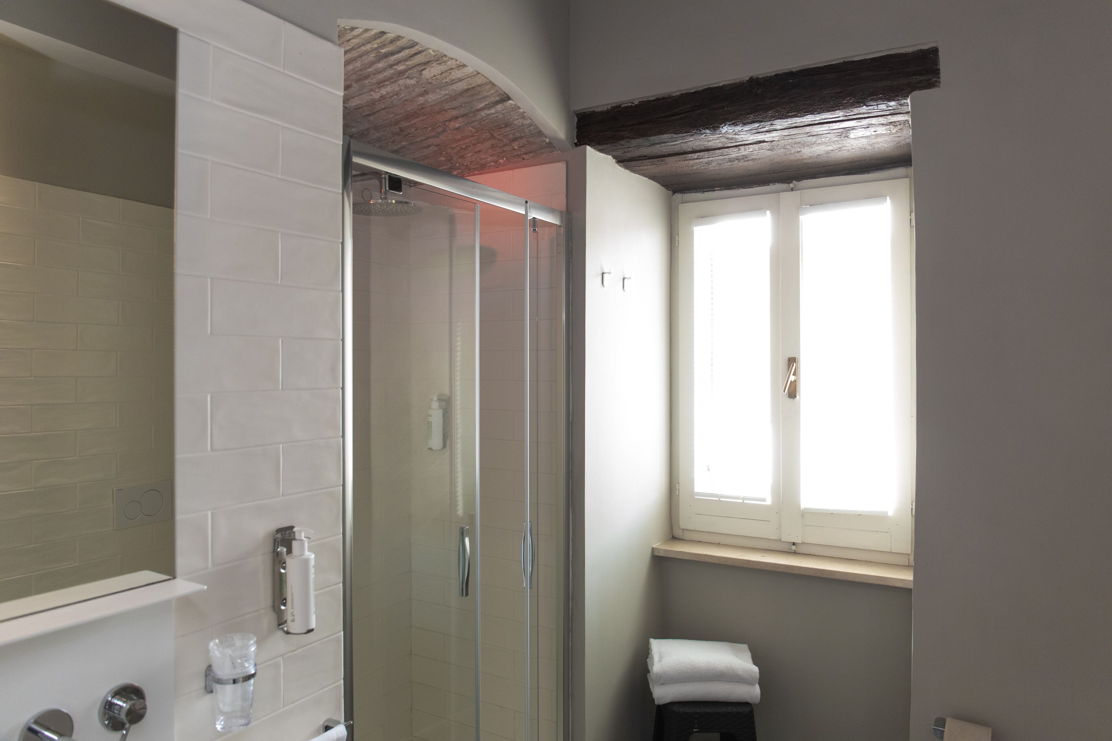 Family Studio Suite | Bathroom | Hair dryer, towels