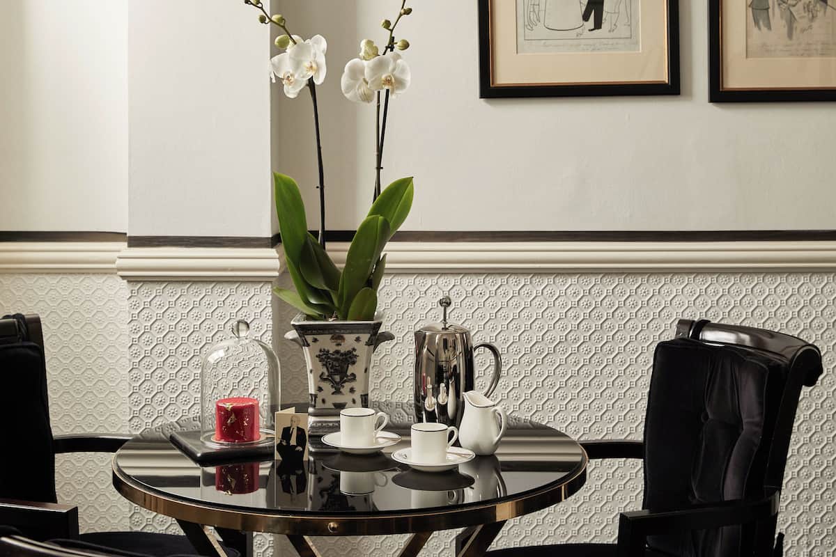 Executive Suite | Premium bedding, minibar, in-room safe, individually decorated