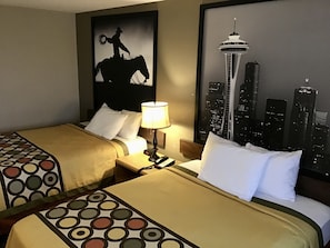 Desk, blackout drapes, iron/ironing board, free cribs/infant beds