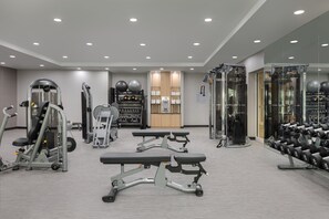 Stay fit on the go with our fully equipped gym featuring a range of exercise machines and free weights.