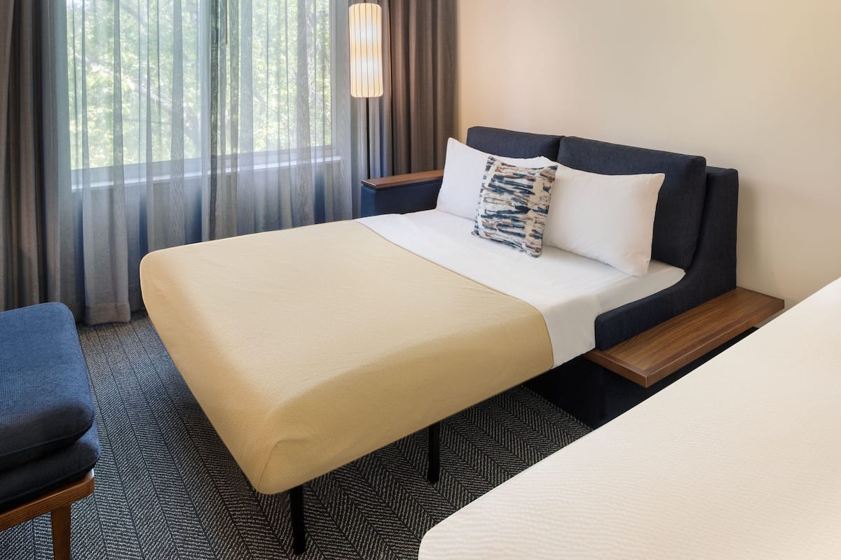 Premium bedding, down duvets, desk, laptop workspace