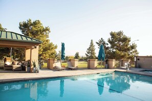 Outdoor pool, open 6 AM to 10 PM, sun loungers