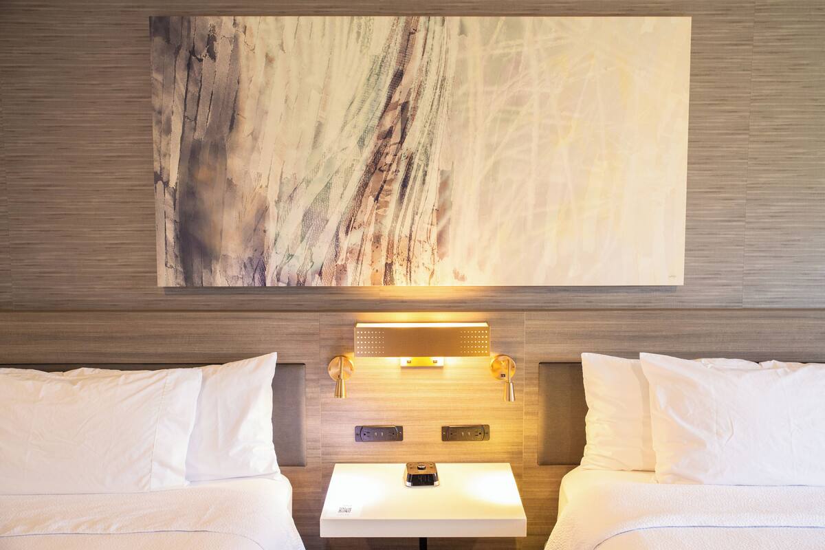 hypo-allergenic bedding, down duvets, in-room safe, blackout curtains