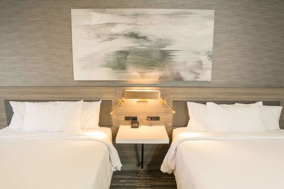 hypo-allergenic bedding, down duvets, in-room safe, blackout curtains