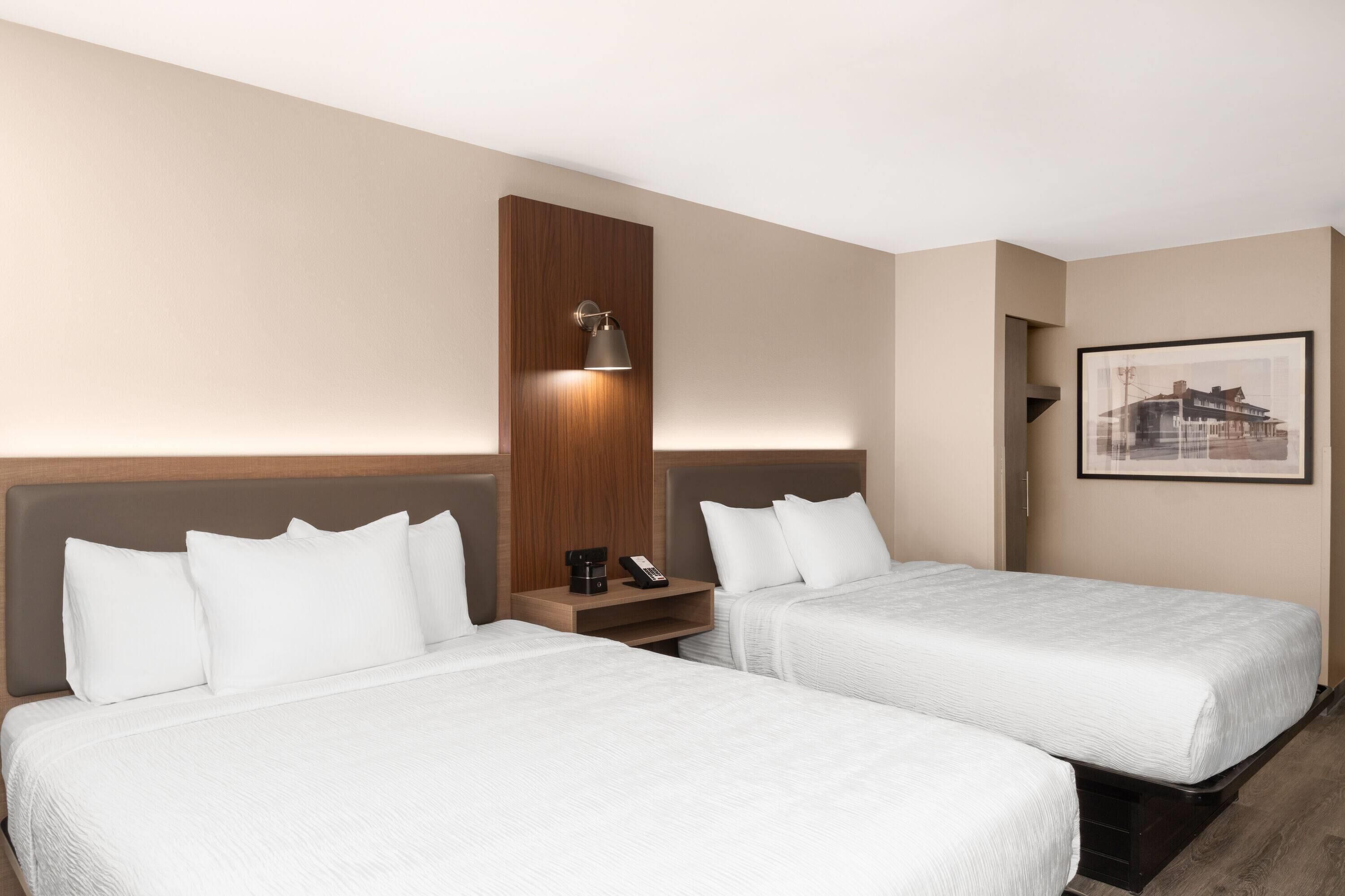 Room, 2 Queen Beds, Hearing Accessible, Non Smoking (Mobility Accessible, Roll-In Shower) | In-room safe, desk, iron/ironing board, free WiFi