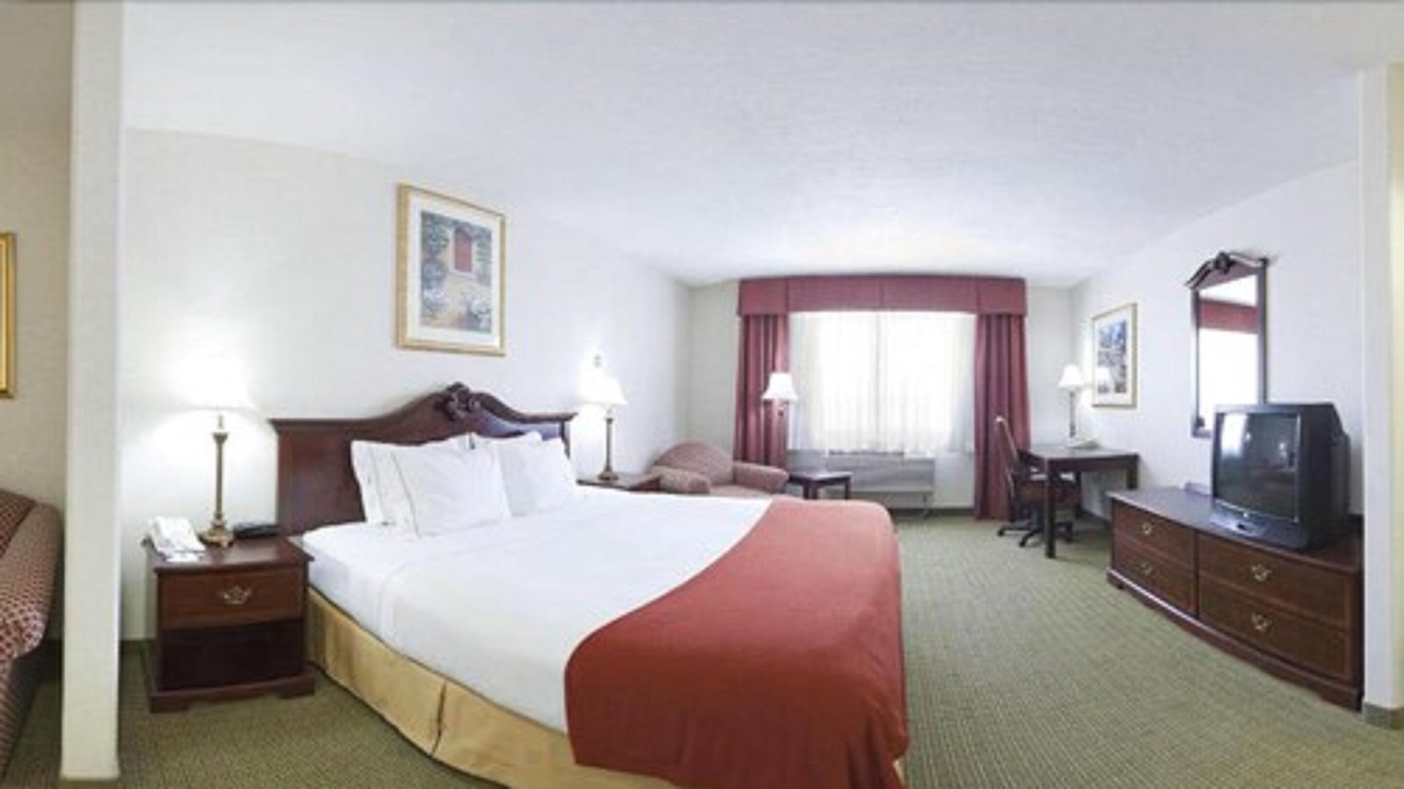 desk, blackout curtains, iron/ironing board, free cots/infant beds