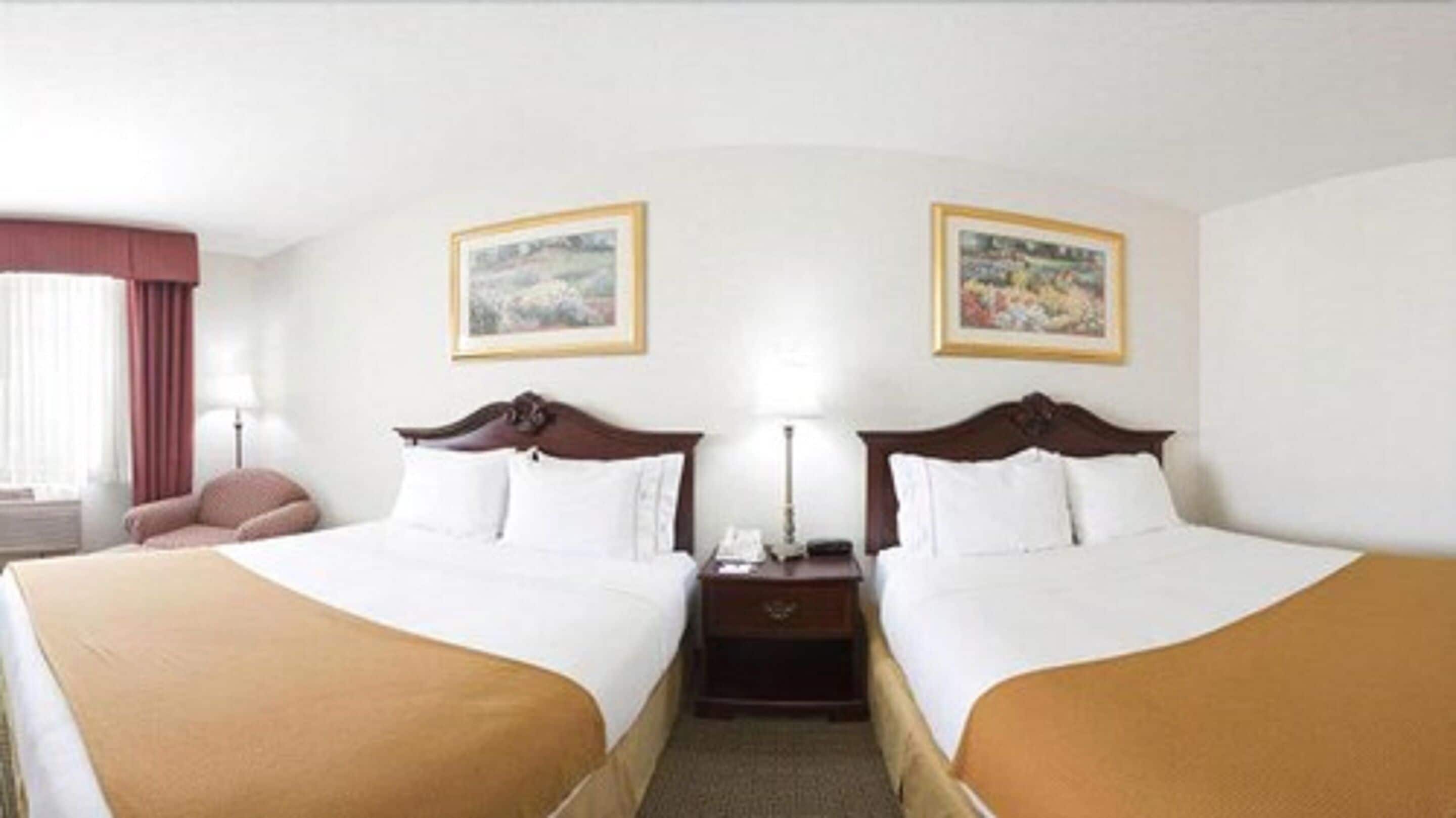 desk, blackout curtains, iron/ironing board, free cots/infant beds