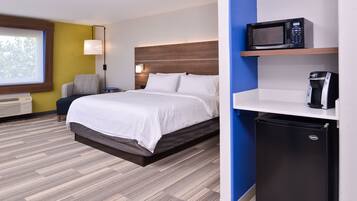 Suite, 1 King Bed | In-room safe, desk, iron/ironing board, cots/infant beds