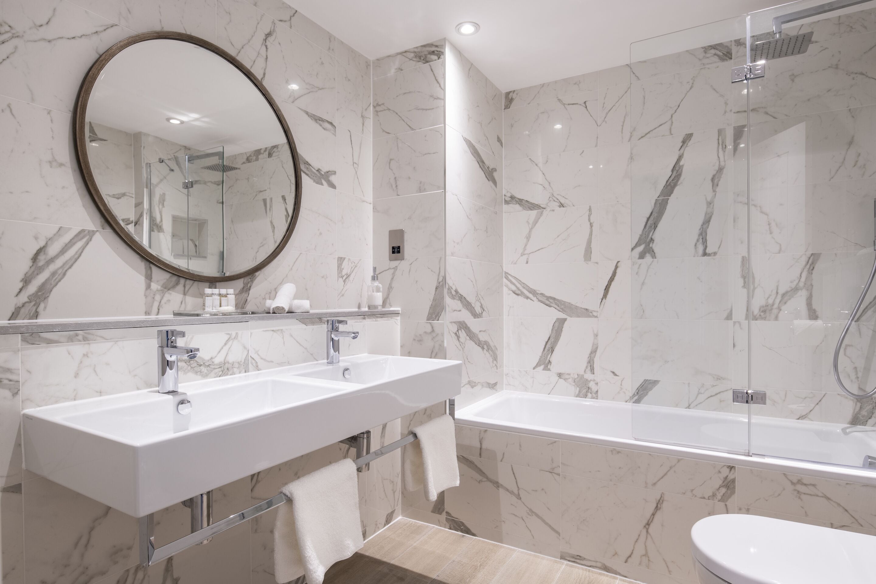 combined shower/bathtub, free toiletries, hair dryer, bathrobes