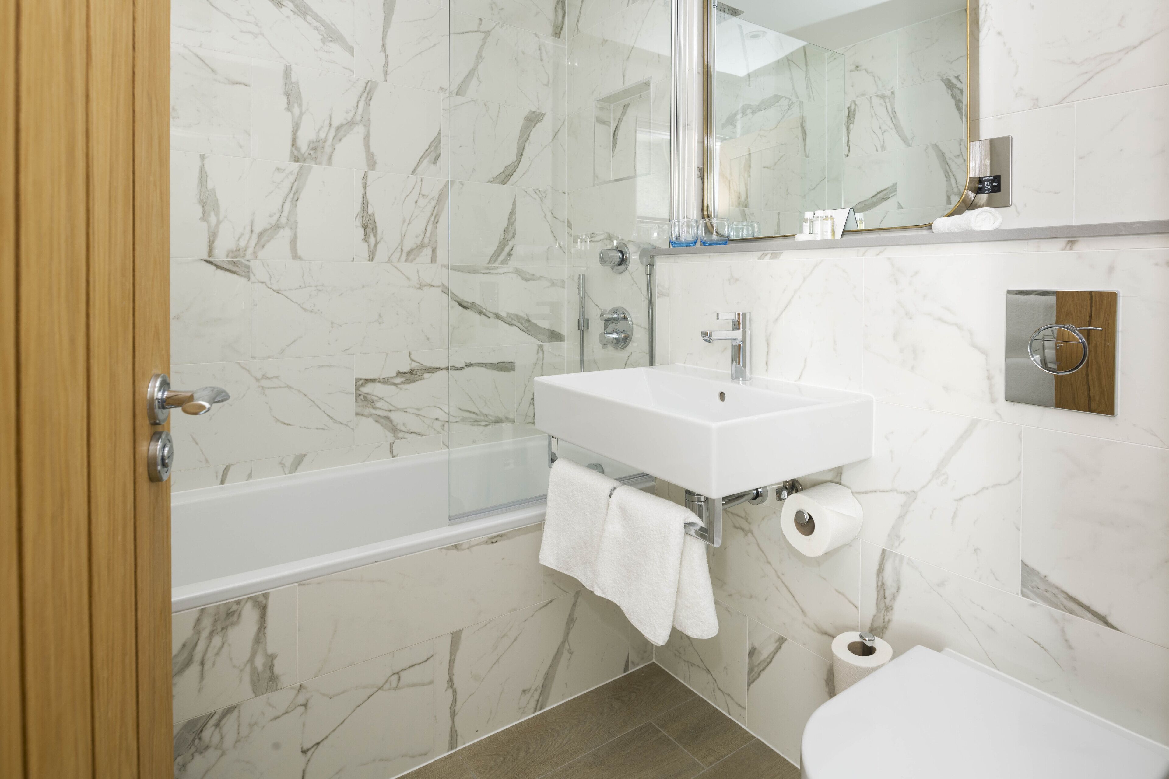 combined shower/bathtub, free toiletries, hair dryer, bathrobes