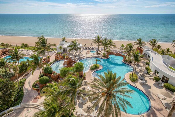 On the beach, beach cabanas, sun loungers, beach umbrellas