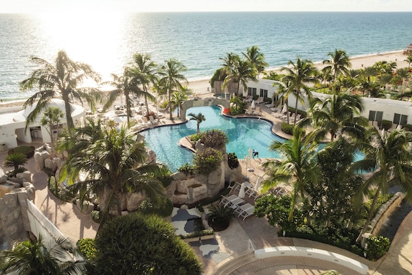 2 outdoor pools, open 8:00 AM to 9:00 PM, cabanas (surcharge)