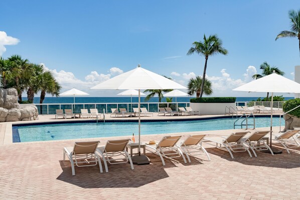2 outdoor pools, open 8:00 AM to 9:00 PM, pool cabanas (surcharge)