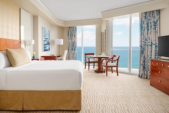 Premium bedding, pillowtop beds, minibar, in-room safe at Trump International Beach Resort