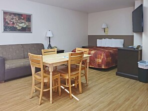 Room, Multiple Beds, Non Smoking, Ground Floor (Efficiency, 3 Queen Beds, No Pets) | Rollaway beds, free WiFi, bed sheets - Rodeway Inn Buffalo (Buffalo)