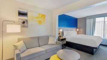 Suite, 1 trÚs grand lit et 1 canapé-lit, non-fumeurs | Coffres-forts dans les chambres, bureau, fer et planche à repasser