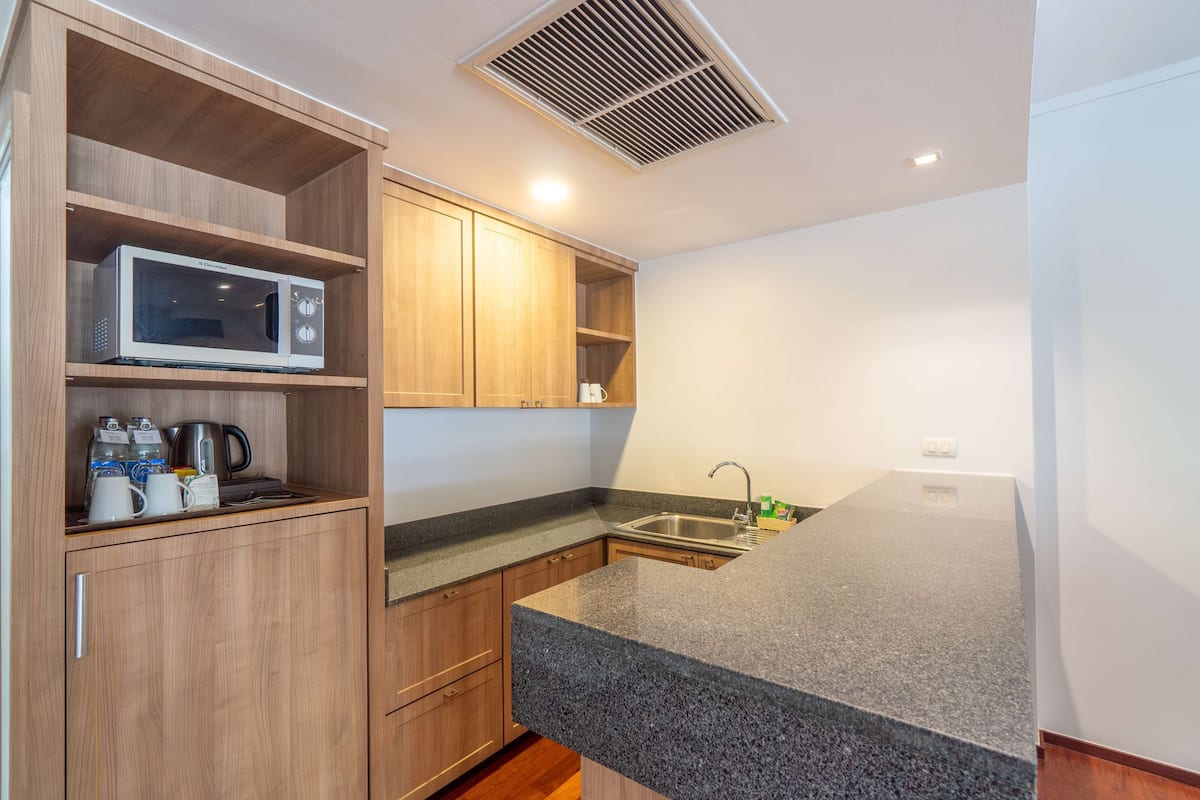 suite, 2 bedrooms, terrace, pool view | 1 bedroom, minibar, in-room safe, desk