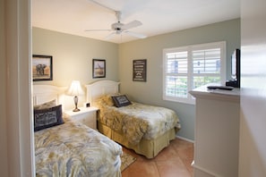 Condo, 2 Bedrooms (Garden/Pool View) | 2 bedrooms, in-room safe, individually decorated, individually furnished