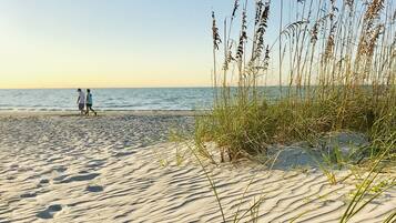 Beach nearby, white sand, beach umbrellas