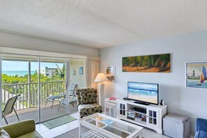 Condo, 2 Bedrooms (Gulf View) | Living room | Flat-screen TV, DVD player