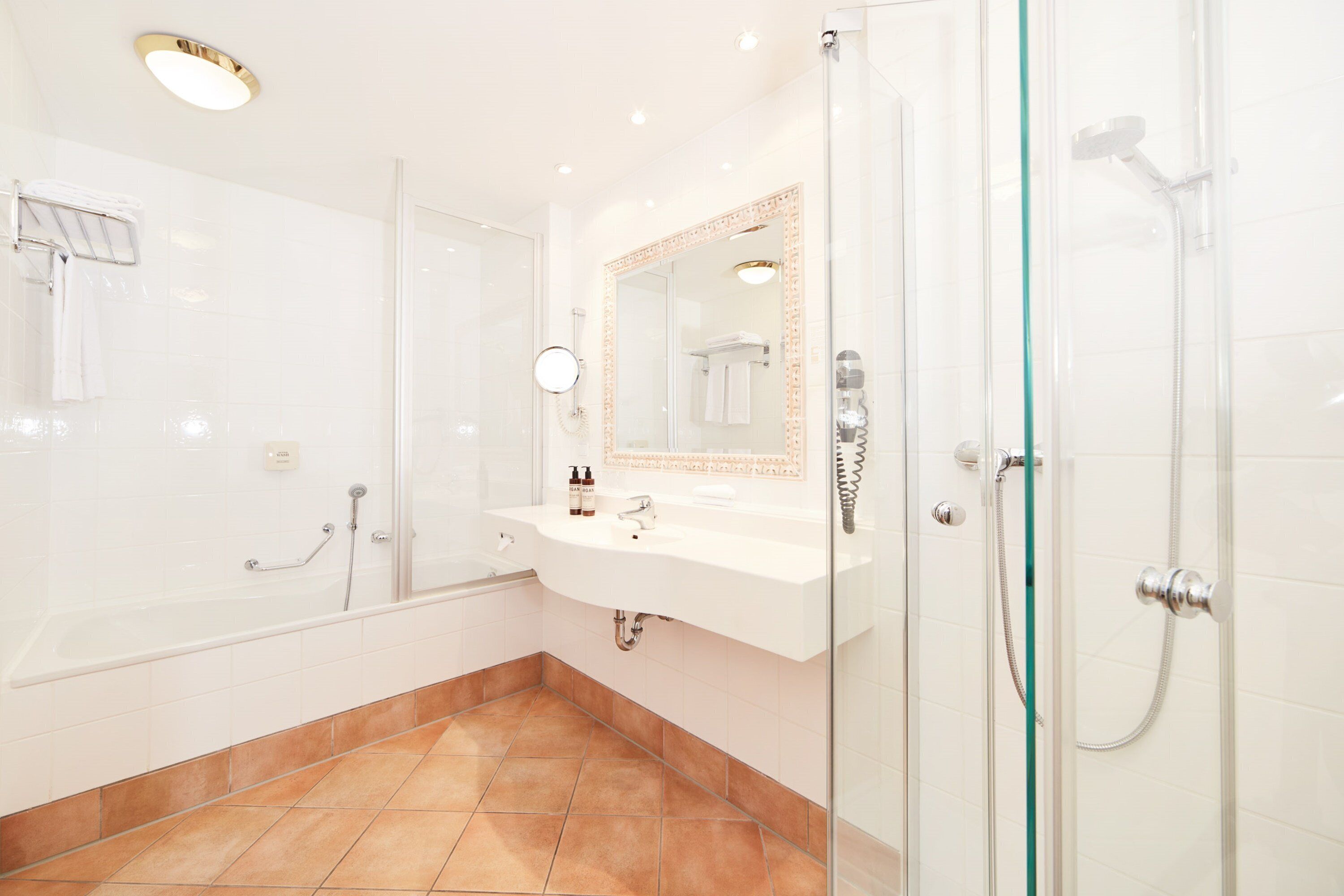 eco-friendly toiletries, hair dryer, bathrobes, heated floors