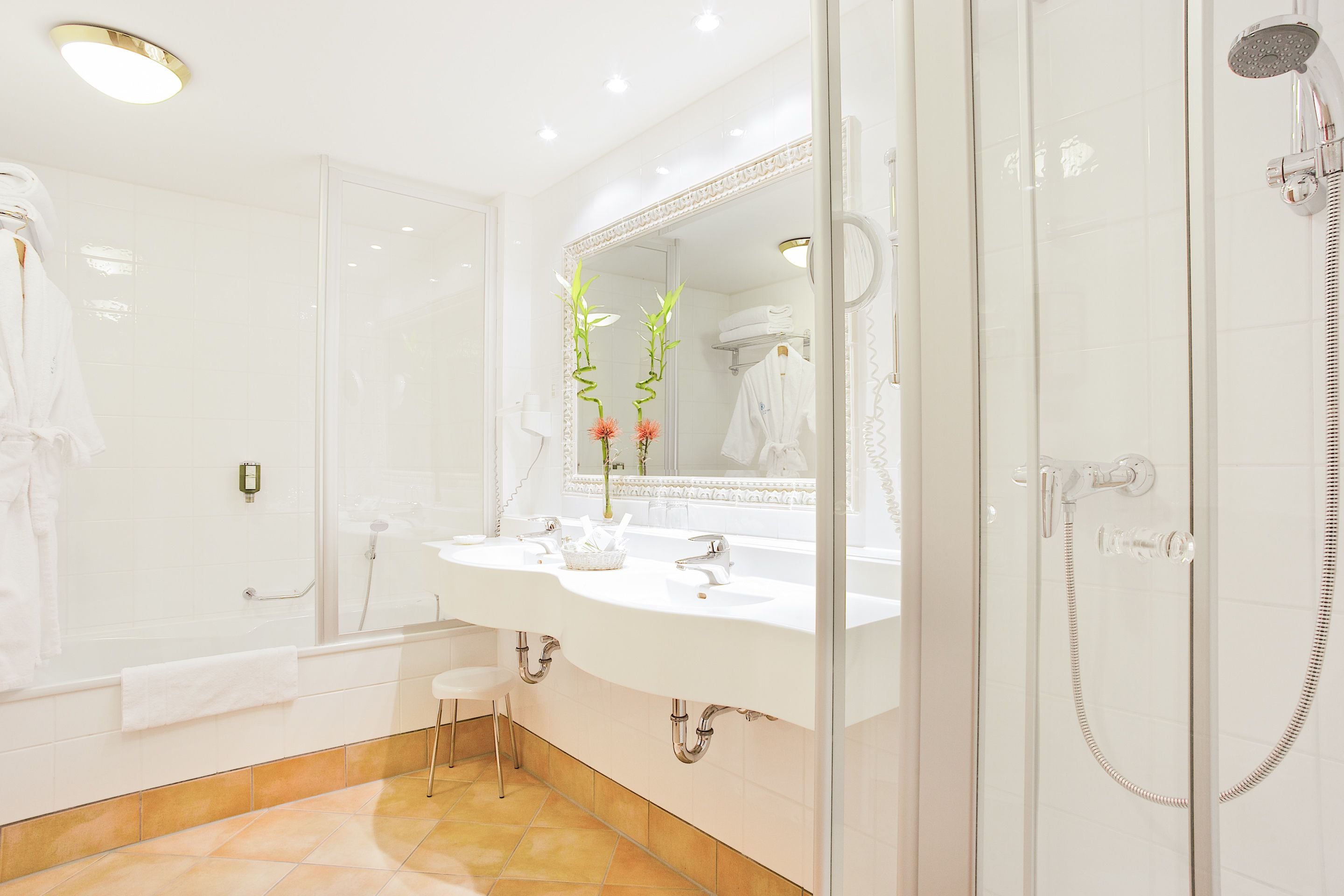 eco-friendly toiletries, hair dryer, bathrobes, heated floors