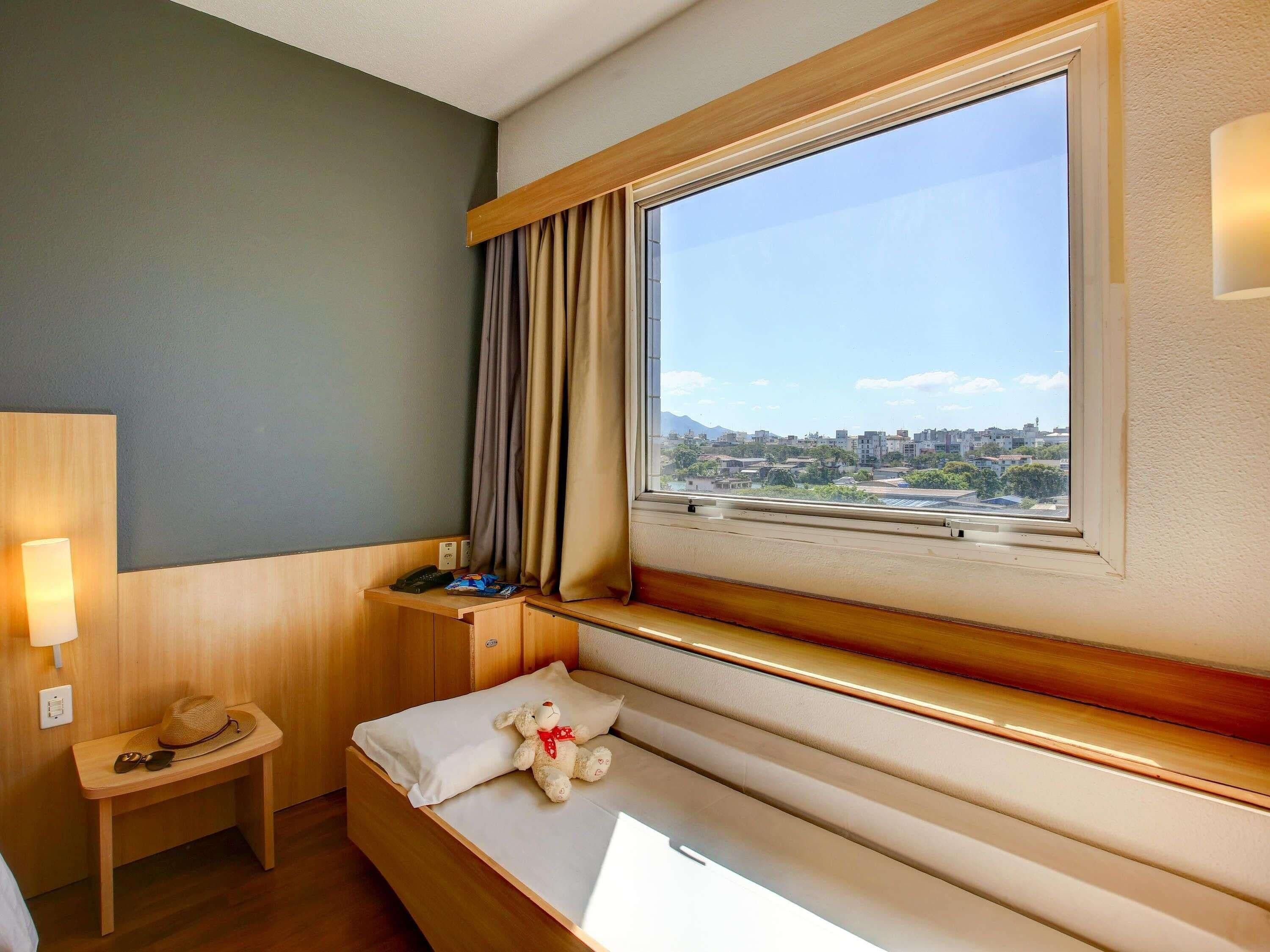 standard room, multiple beds | minibar, desk, laptop workspace, blackout curtains