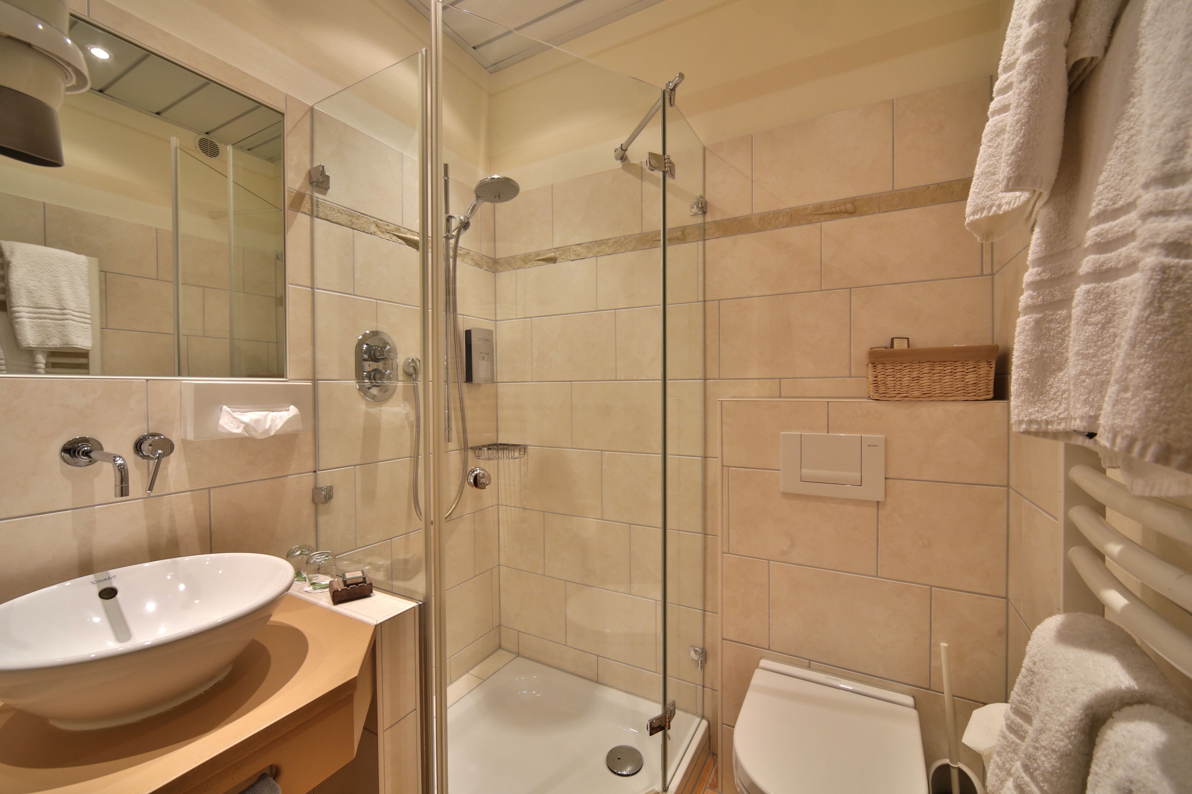 shower, free toiletries, hair dryer, towels