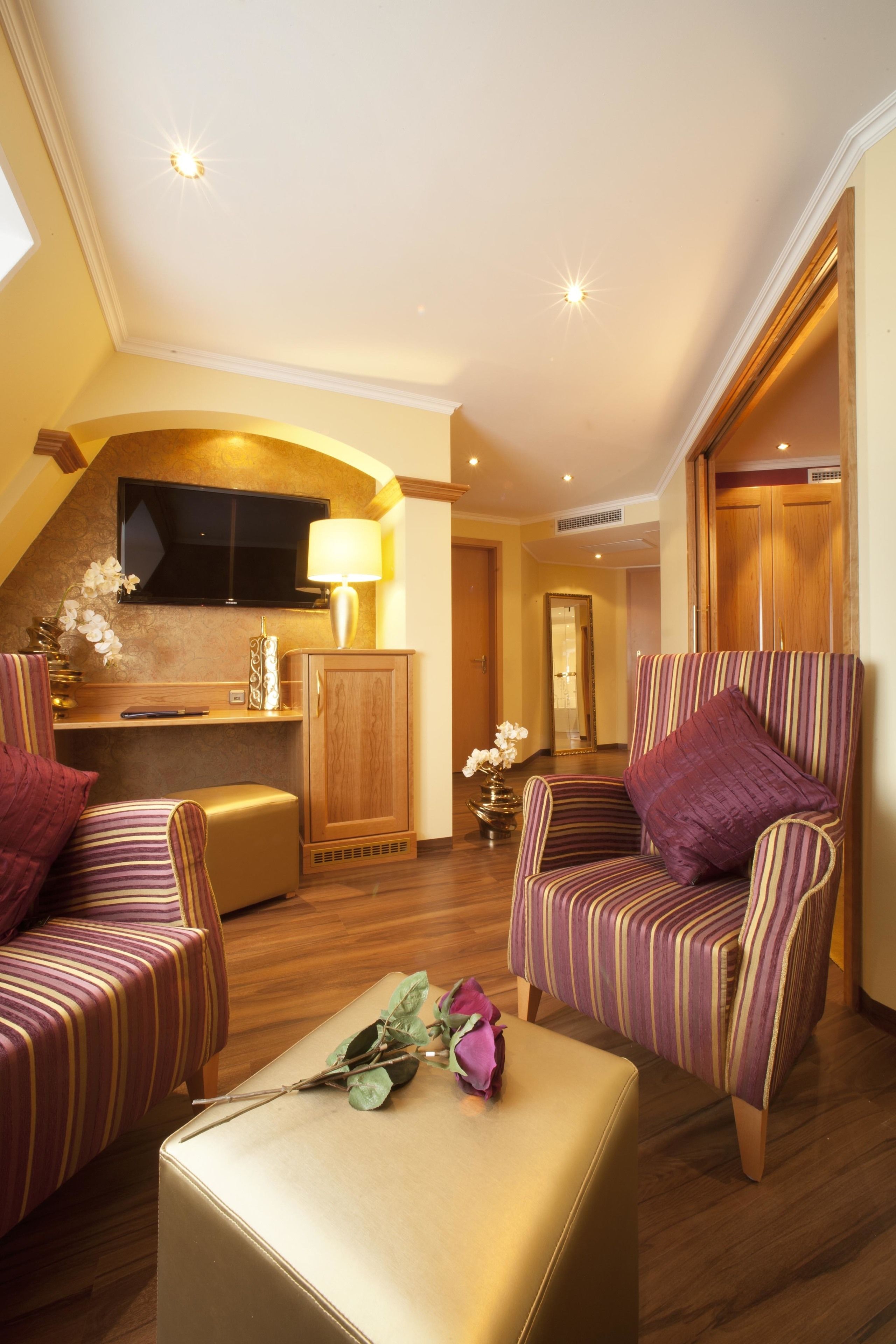 suite (royal) | living room | 32-inch flat-screen tv with satellite channels, tv