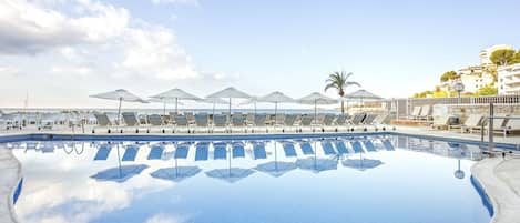 Seasonal outdoor pool, pool loungers