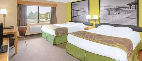 A hotel room with two beds, a desk, a chair, and a large window with curtains.