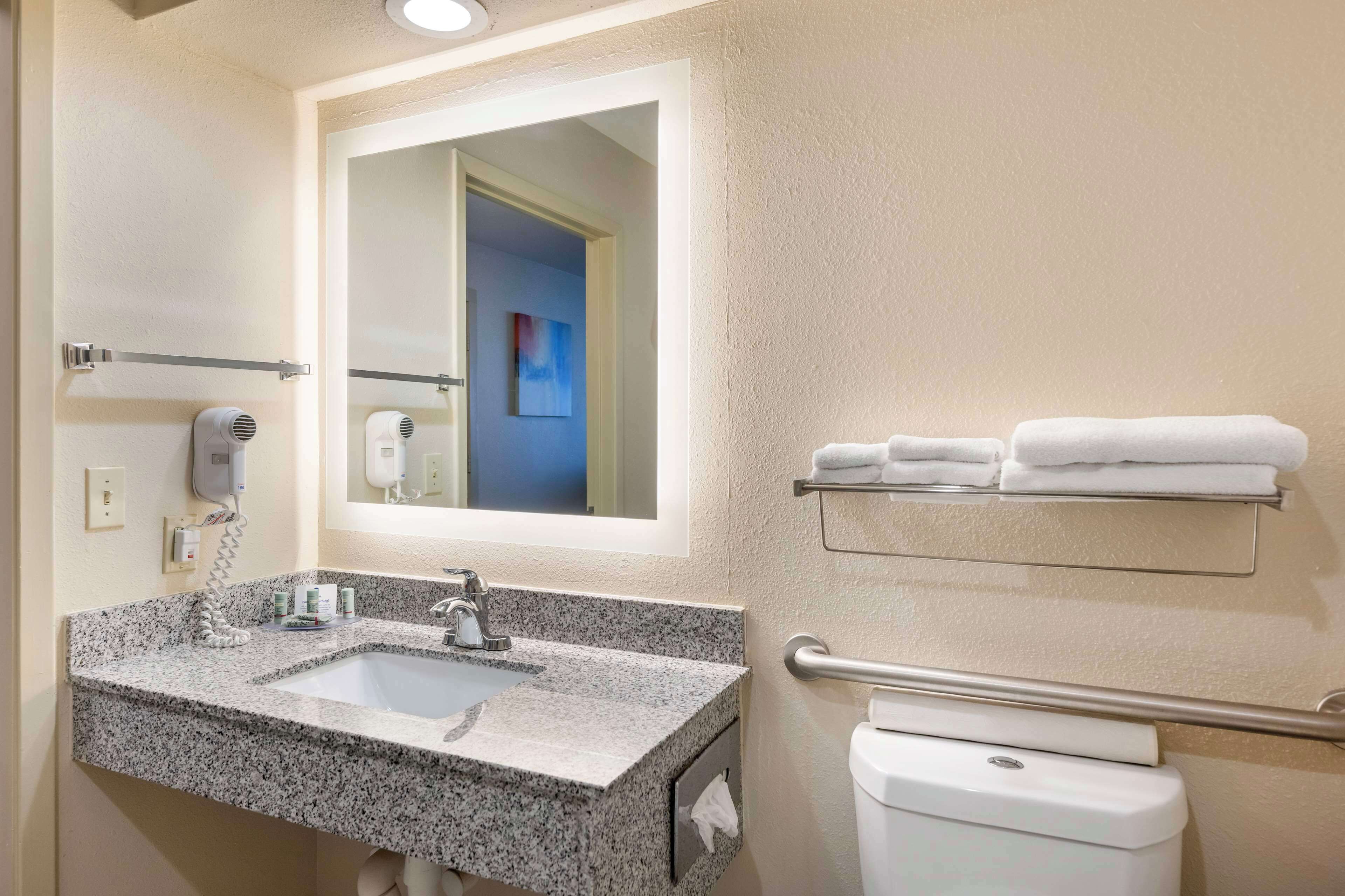 combined shower/bathtub, hair dryer, towels, soap