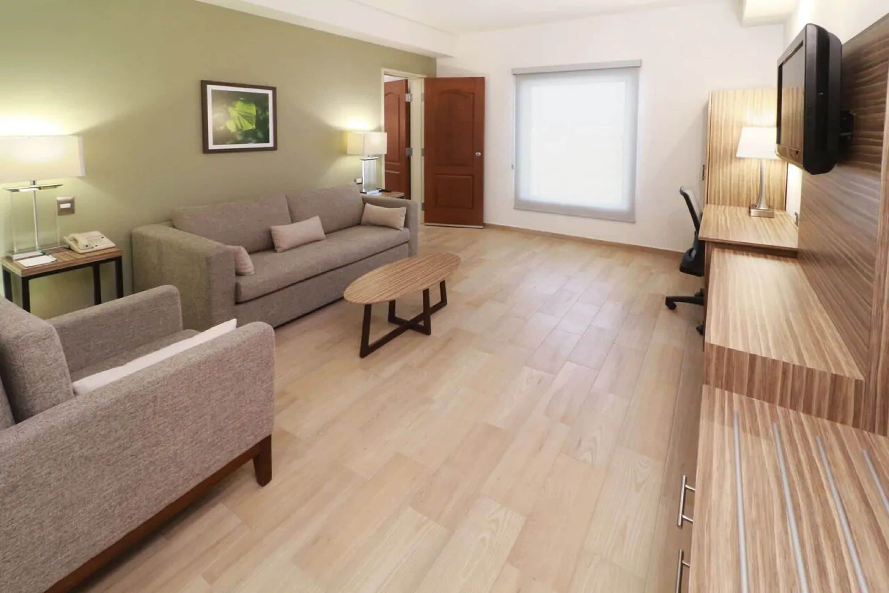 junior suite, 1 bedroom, non smoking (1 king bed) | premium bedding, in-room safe, desk, laptop workspace