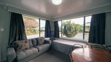 xxx - 2 br tourist flats | Living area | 30-inch flat-screen TV with digital channels, TV, DVD player