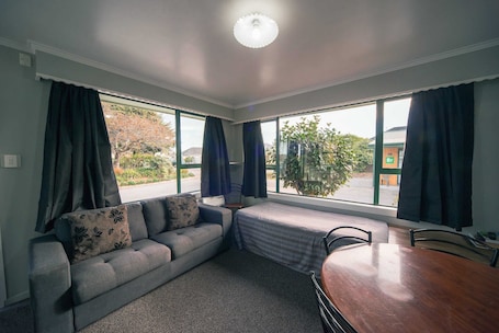 xxx - 2 br tourist flats | Living area | 30-inch flat-screen TV with digital channels, TV, DVD player