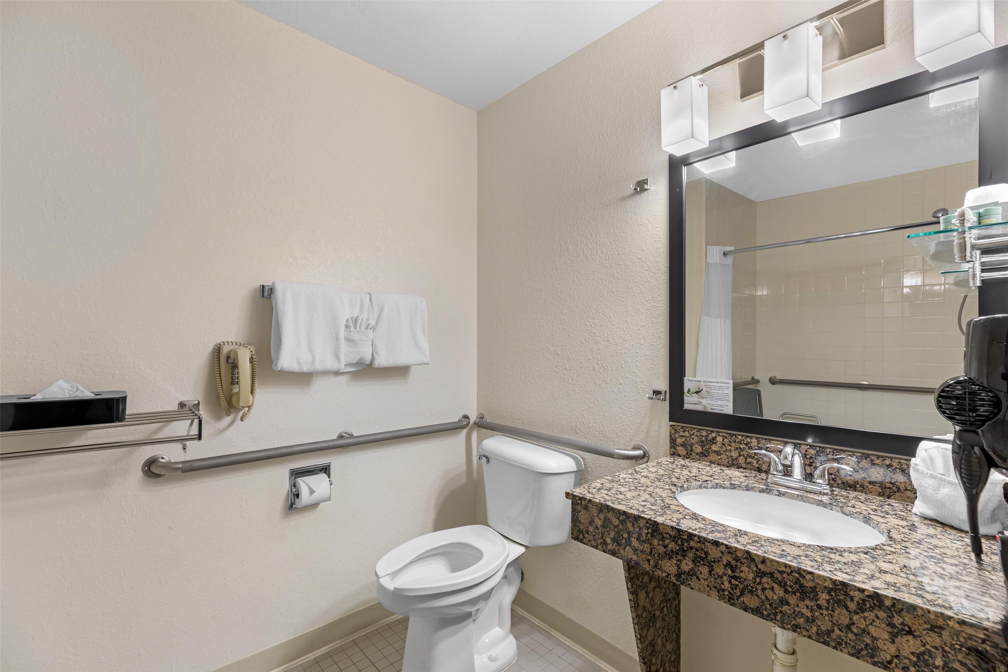 combined shower/bathtub, free toiletries, hair dryer, towels