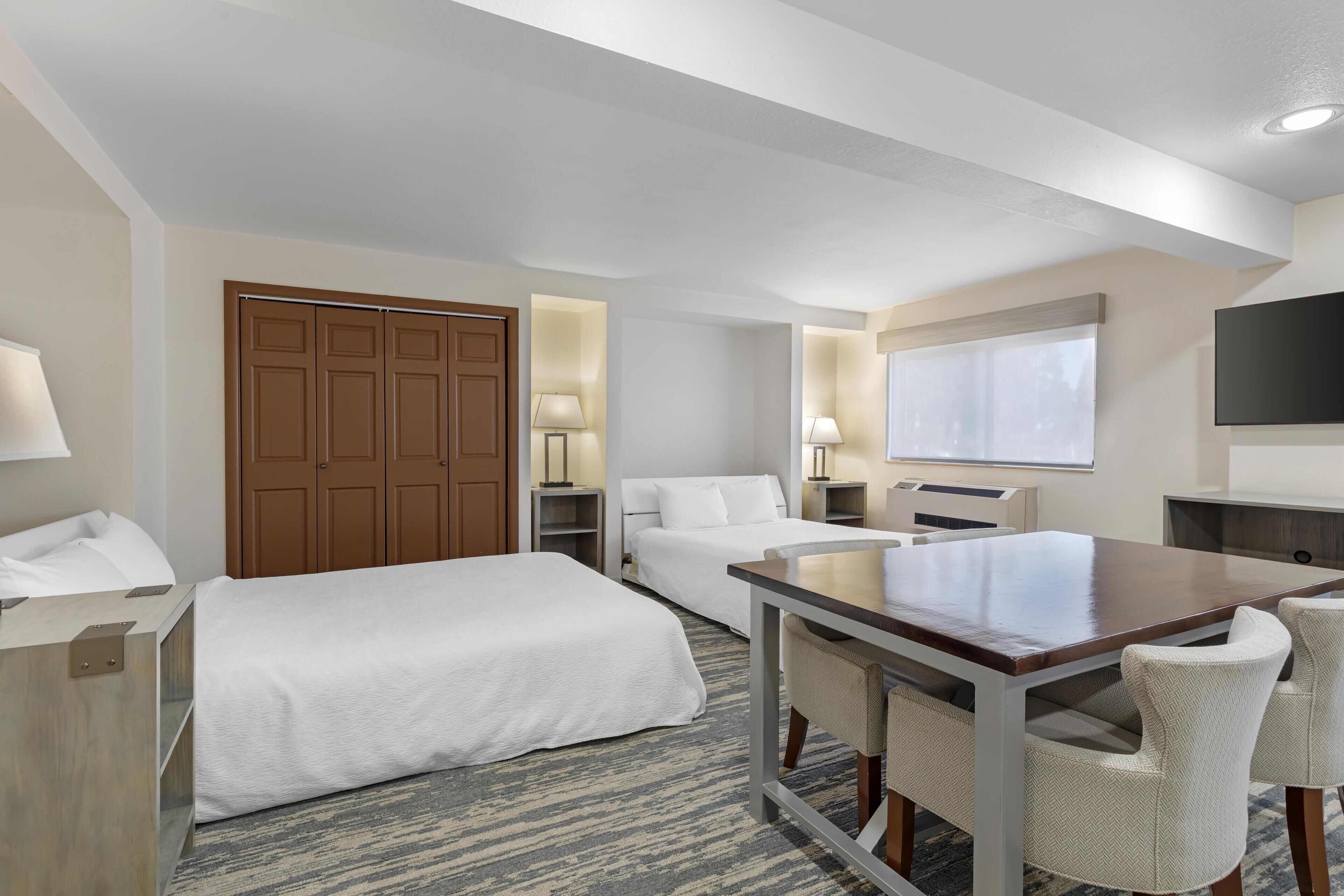 suite, 2 queen size beds, accessible bathtub, with sofabed | desk, blackout curtains, iron/ironing board, rollaway beds