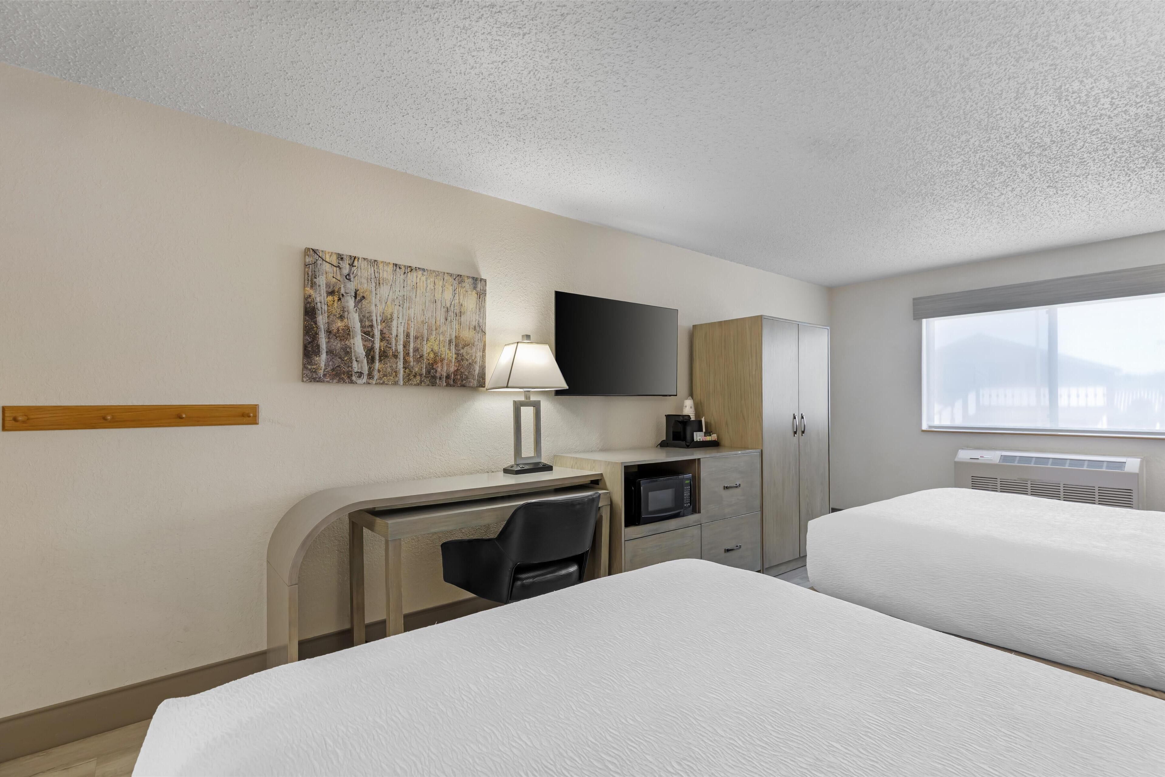 deluxe two queens non-smoking, pet friendly | desk, blackout curtains, iron/ironing board, rollaway beds