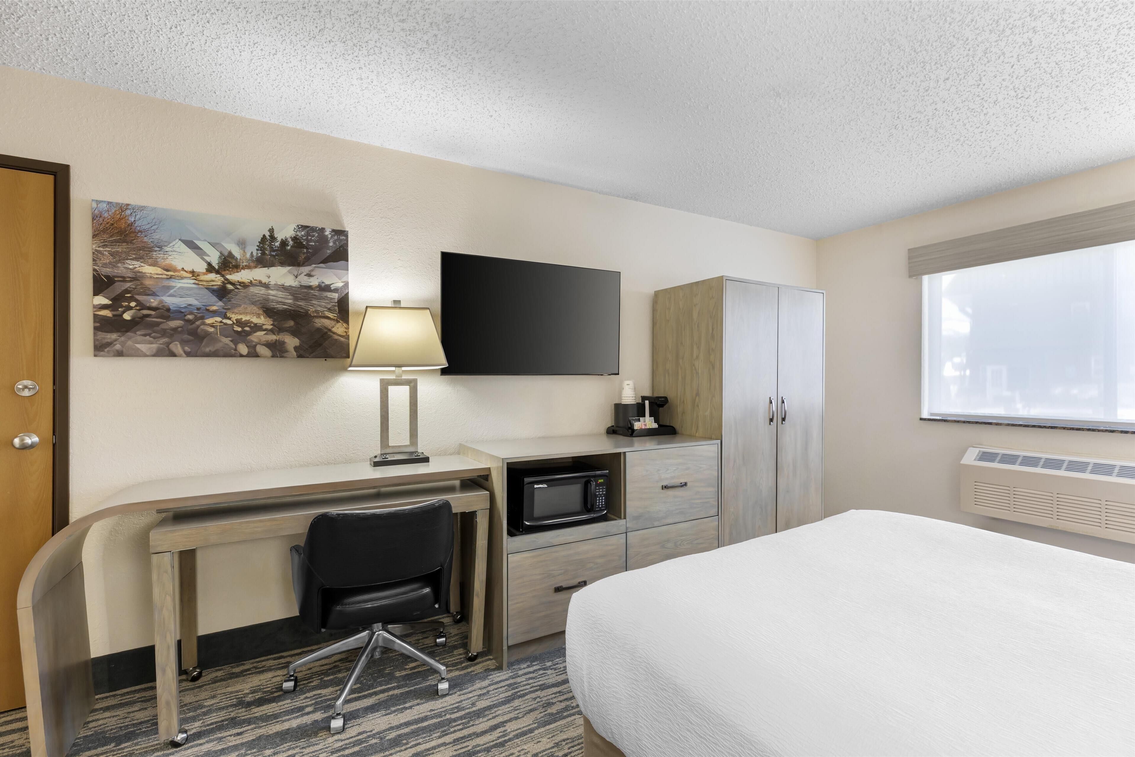 ada accessible roll-in-shower, deluxe one queen non-smoking, non pet friendly | desk, blackout curtains, iron/ironing board, rollaway beds