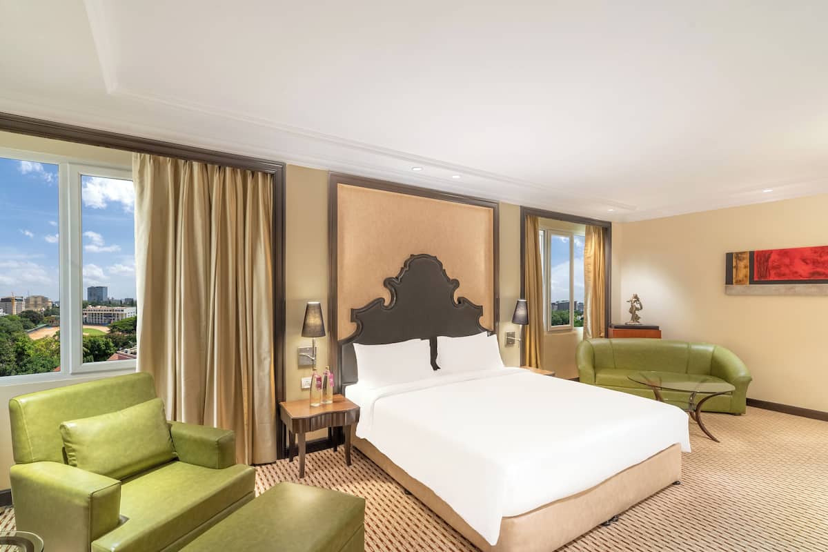 Habitación ejecutiva | Ropa de cama de alta calidad, camas Select Comfort y minibar