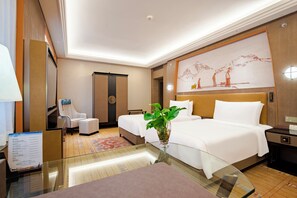 Habitación estándar con 2 camas individuales | Edredones de plumas, minibar, caja fuerte y decoración individual